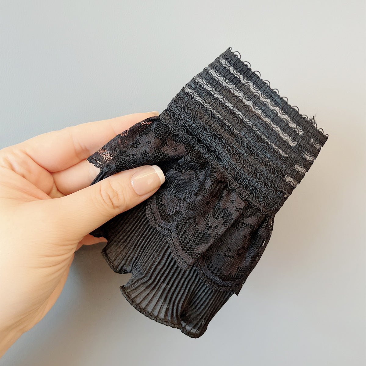 Detachable lace wrist cuffs in black with pleated ruffle layers