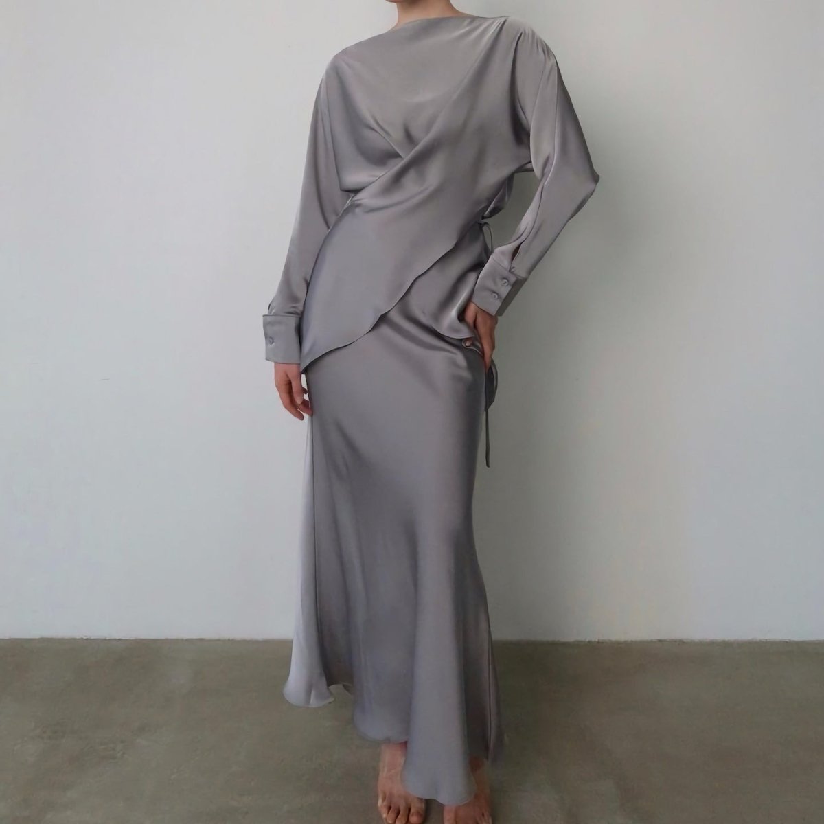 Front silhouette of powder blue maxi skirt suit set