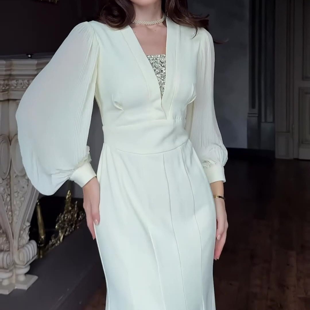 Front view of vintage-inspired formal gown with lace trim neckline