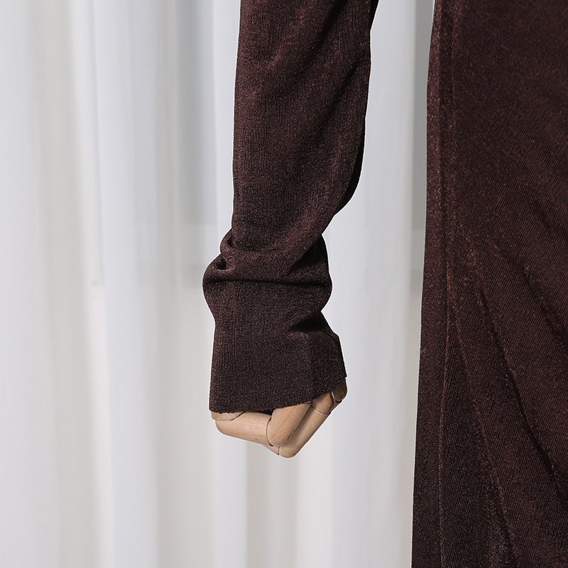 Close-up of side ruched waist and hip detailing on the fitted maxi dress