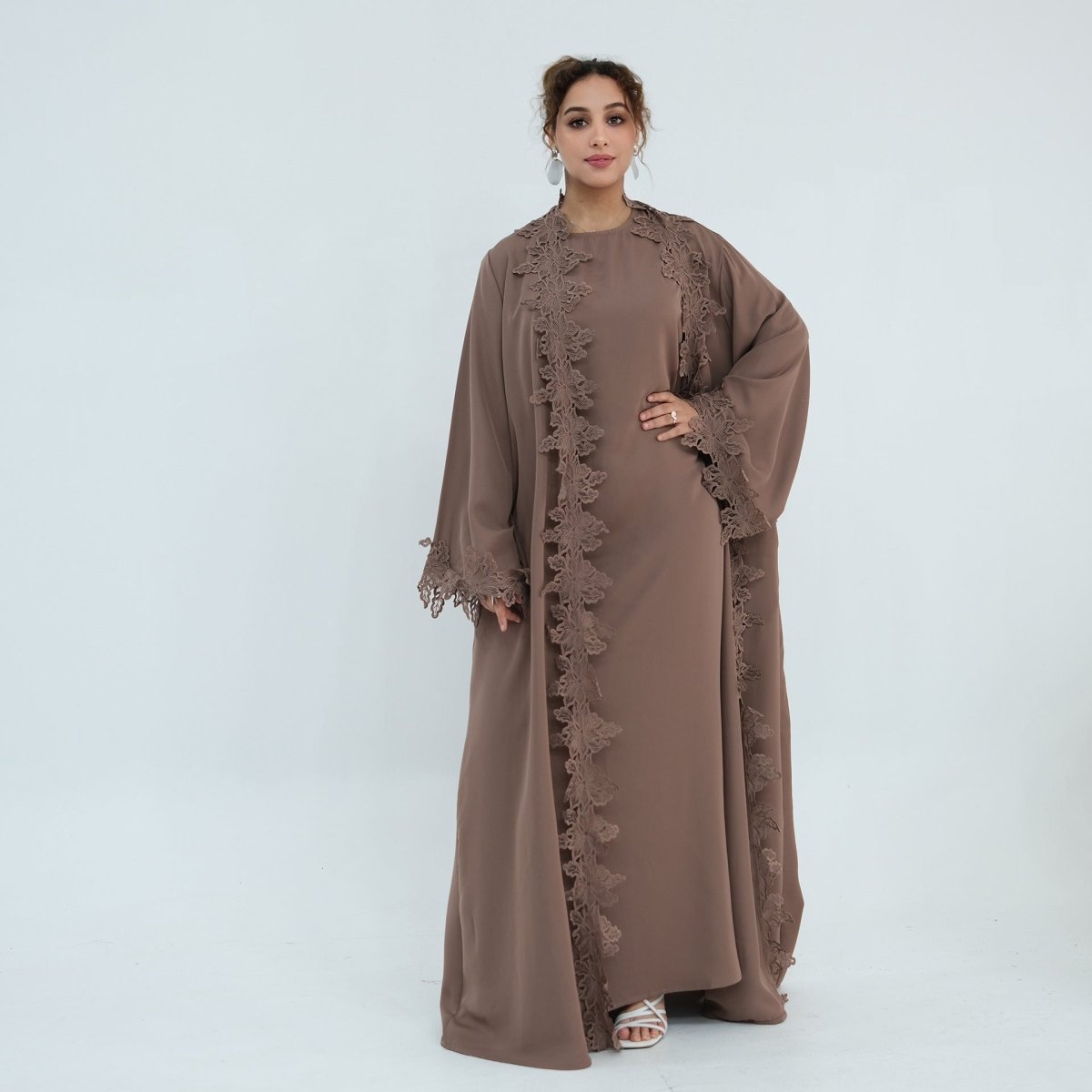 Eyelash lace trim detail along open abaya front panel