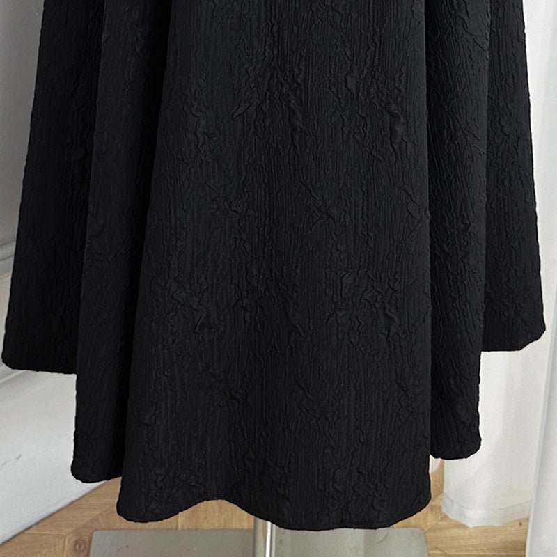 Full-length side view of lace party dress with empire waist and sheer sleeves