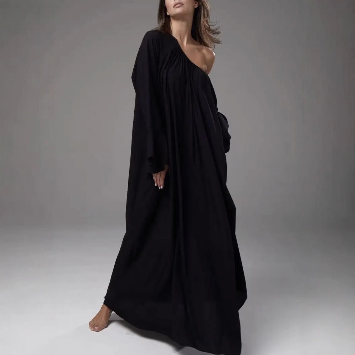 Off-shoulder styling of white ruffle cuff loungewear abaya