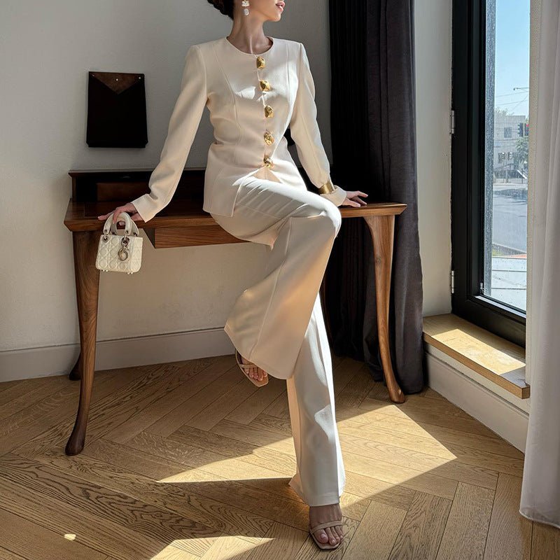 Gold button blazer in apricot with polished tailoring and structured shoulders