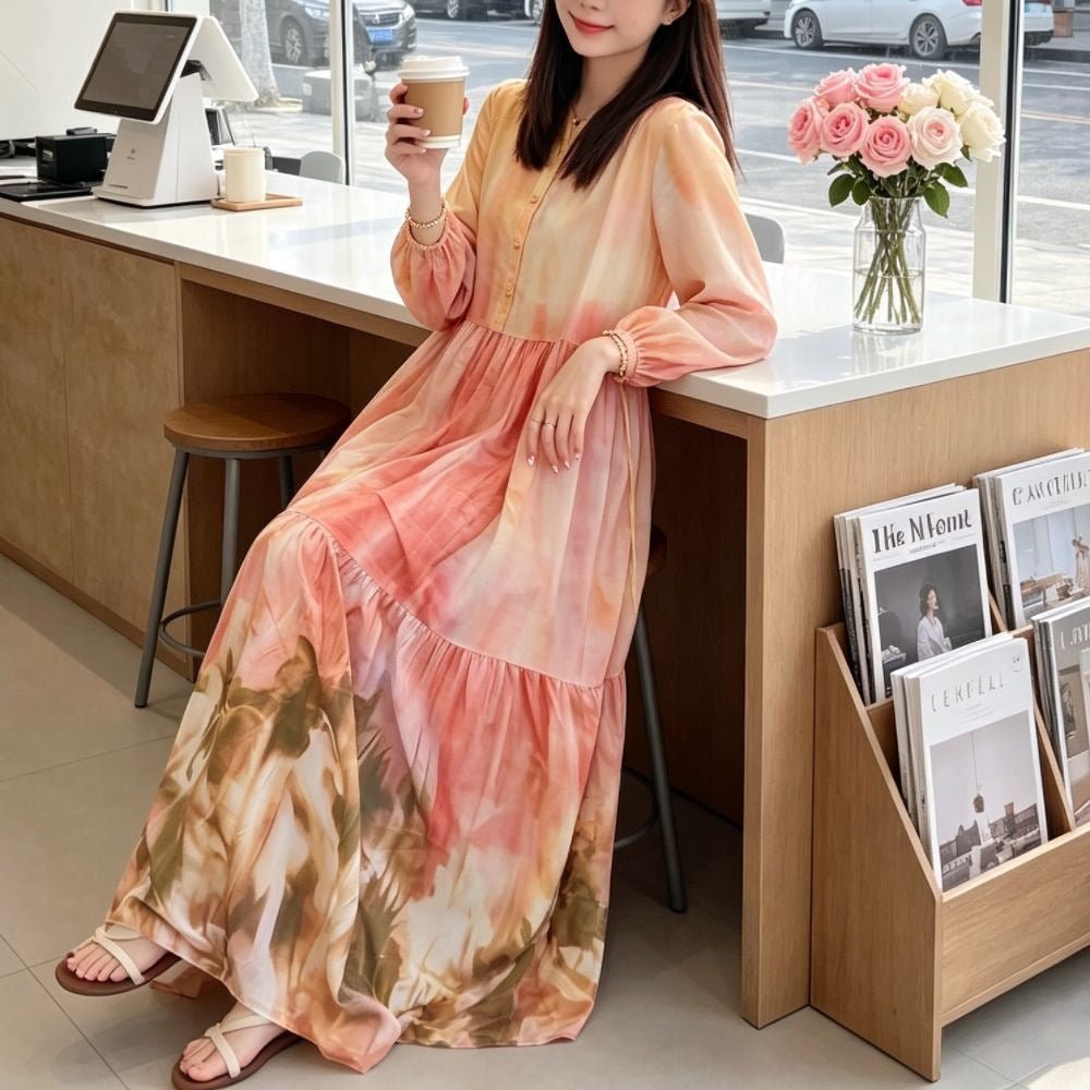 Back view of loose flowing tie-dye maxi dress with tiered hem