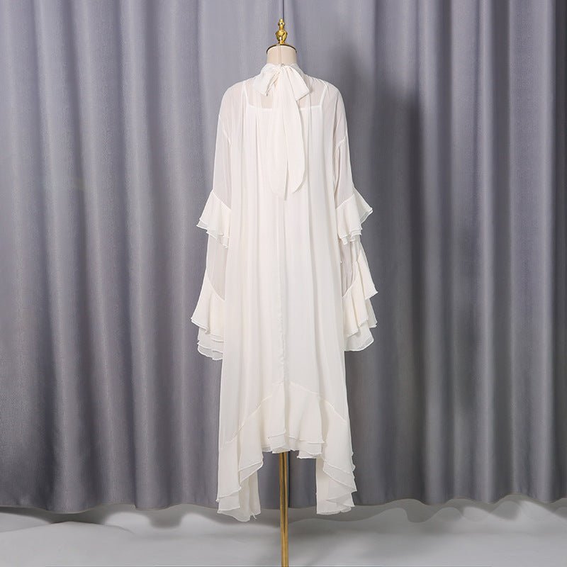 Front view of white chiffon tiered ruffle bell sleeve dress