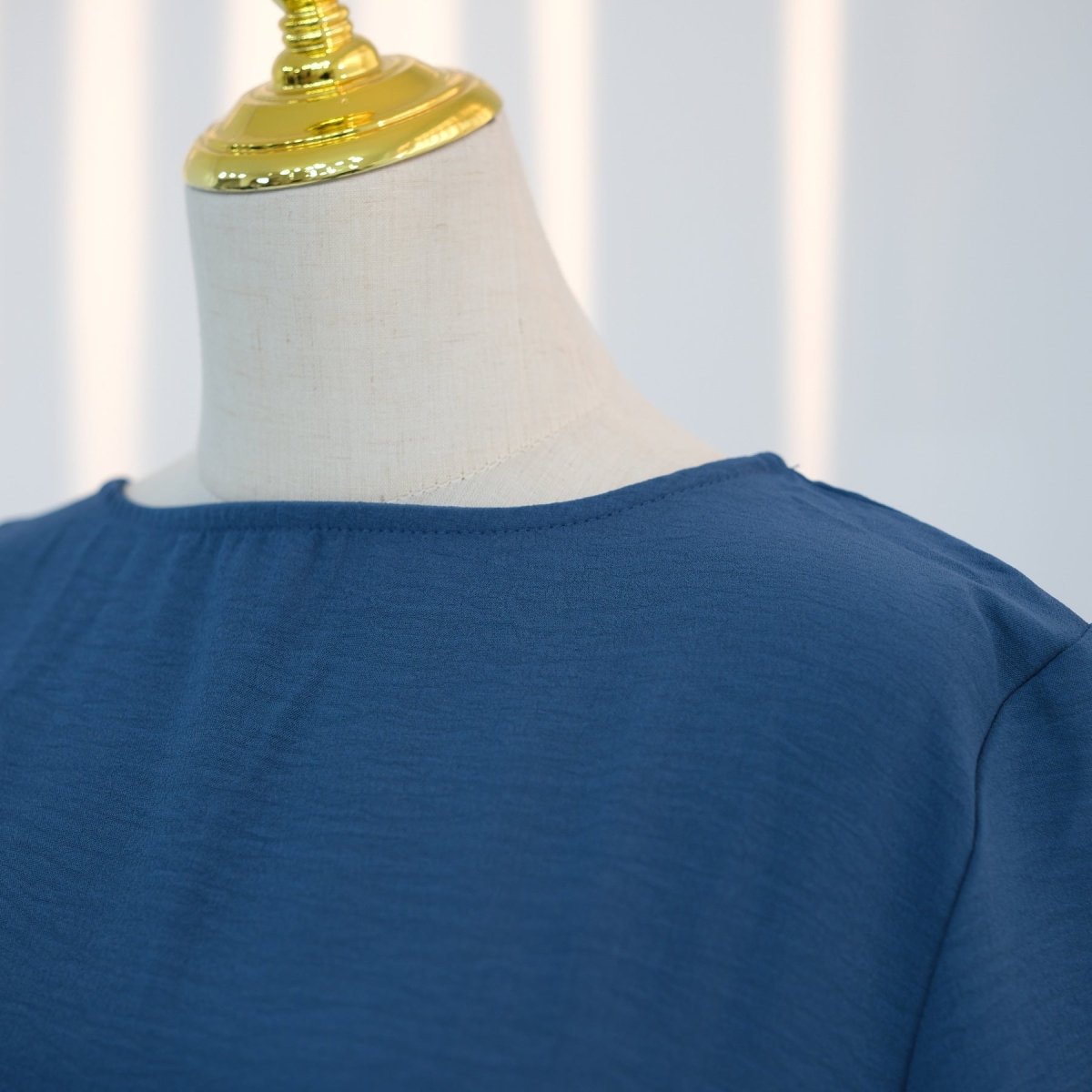 Back view of the modest basic slip dress in crinkled ice silk
