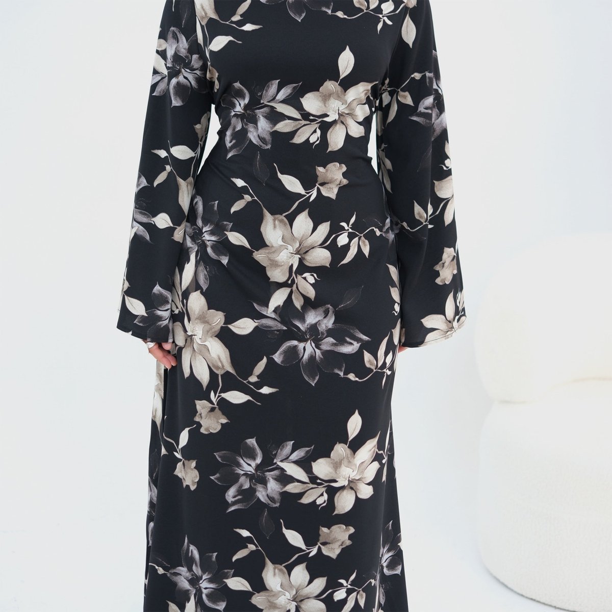 Round neckline and bodice detail of ink floral satin maxi dress