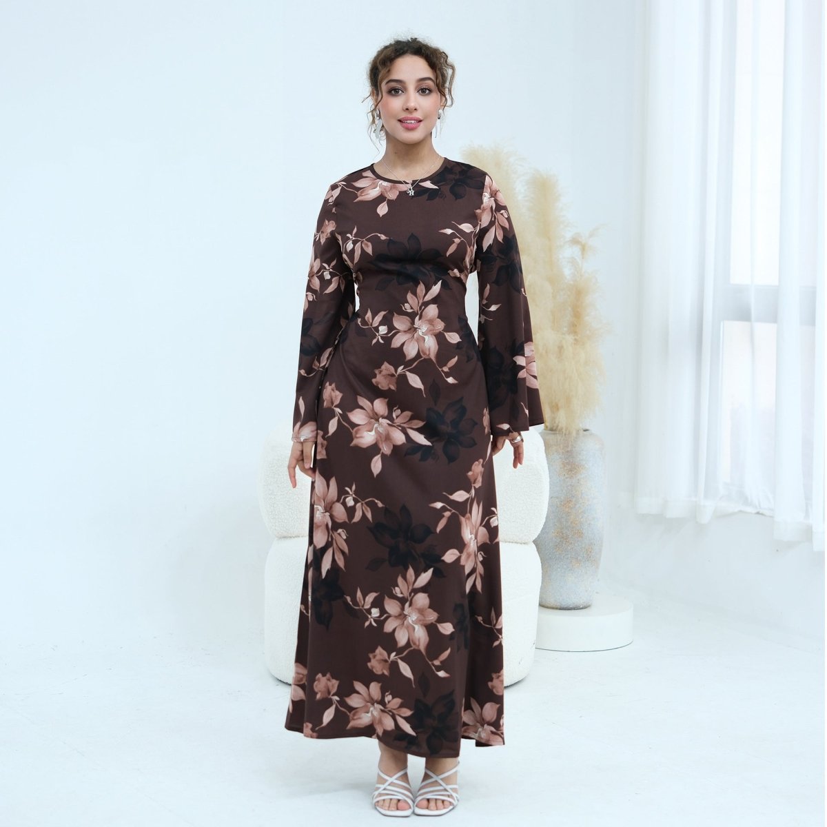 Back view of ink floral satin maxi dress showing concealed zip and A-line skirt
