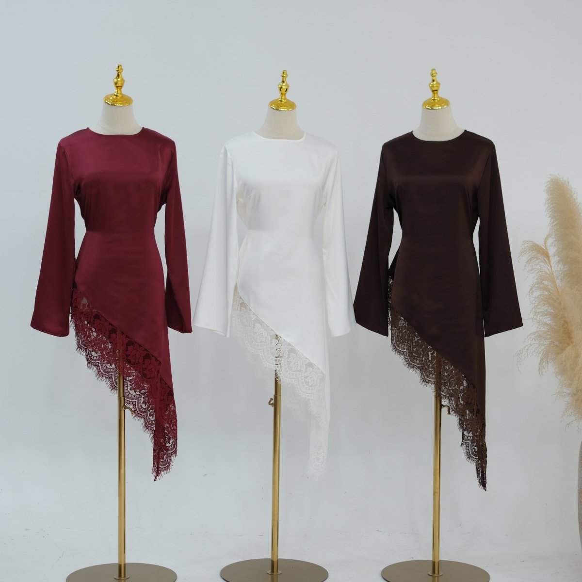 Front view of lace trim satin top showing tonal hem lace detail