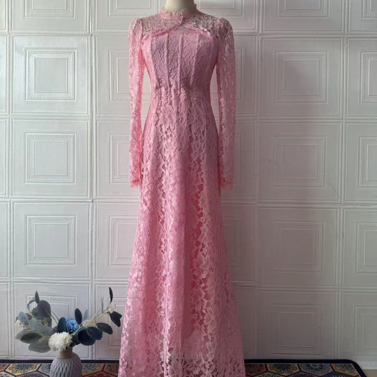 Luxury lace maxi dress in vibrant red with floor-length silhouette