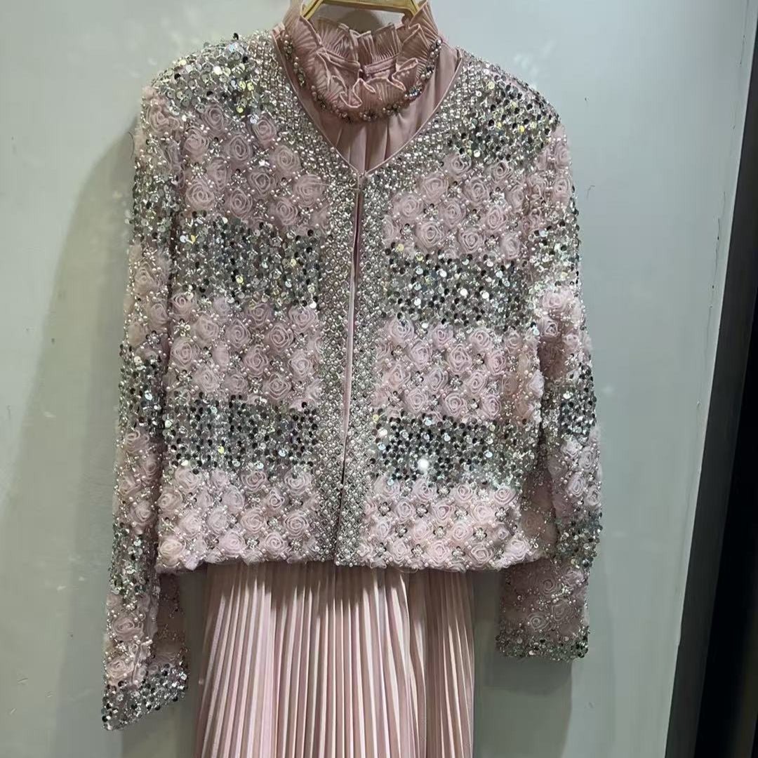 Back view of cropped embellished bridal jacket