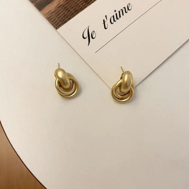 MAC064 Interlocking Circle Earrings - Mariam's Collection