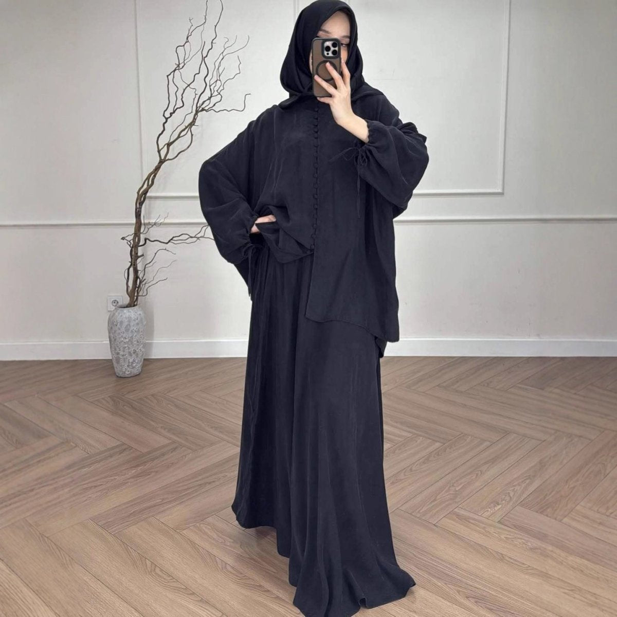 Oversized batwing tunic in coffee with dramatic sleeve silhouette