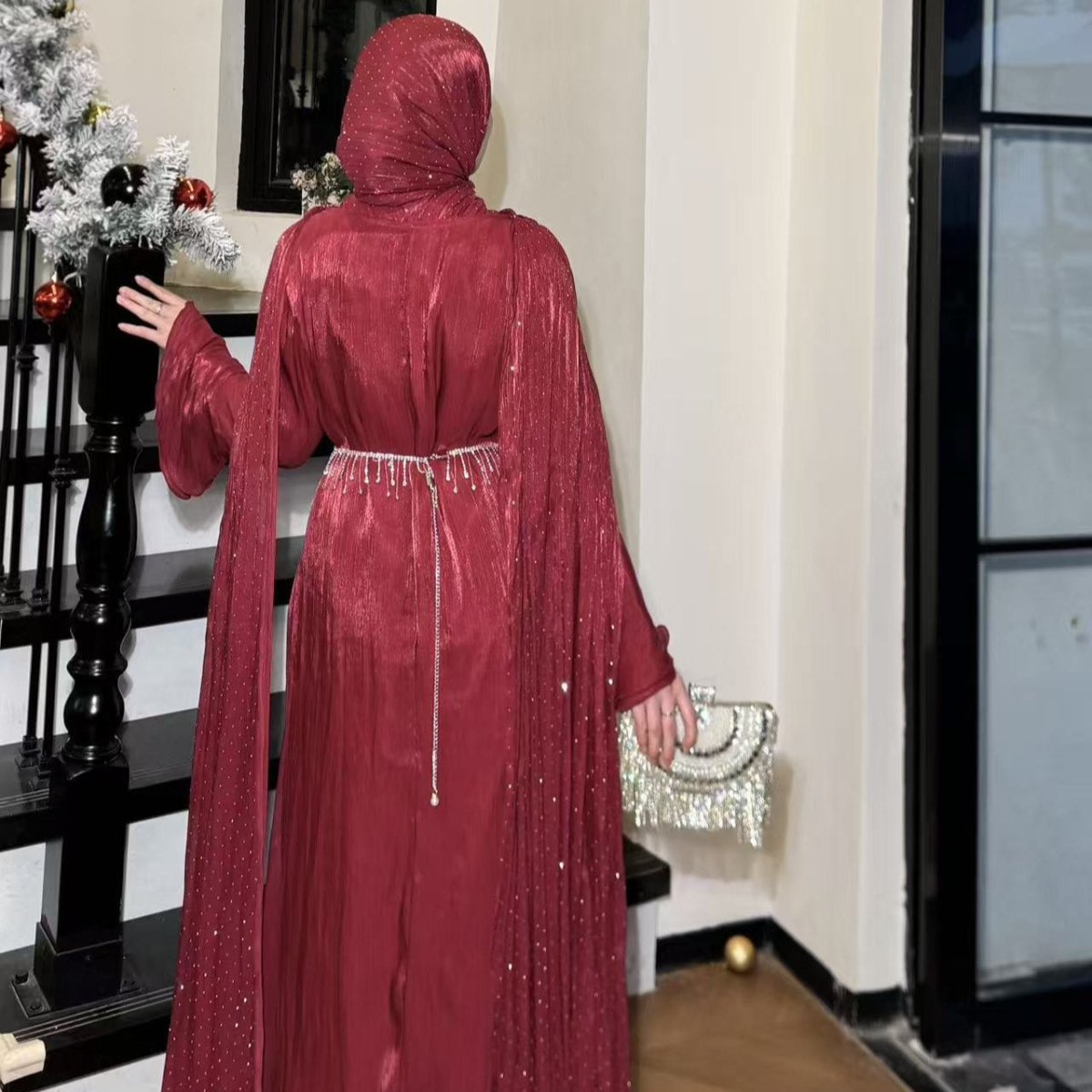 Regal silhouette of cape sleeve abaya styled for a formal event