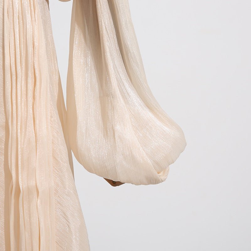 Tiered ruffle hem detail of asymmetric midi-to-maxi satin dress