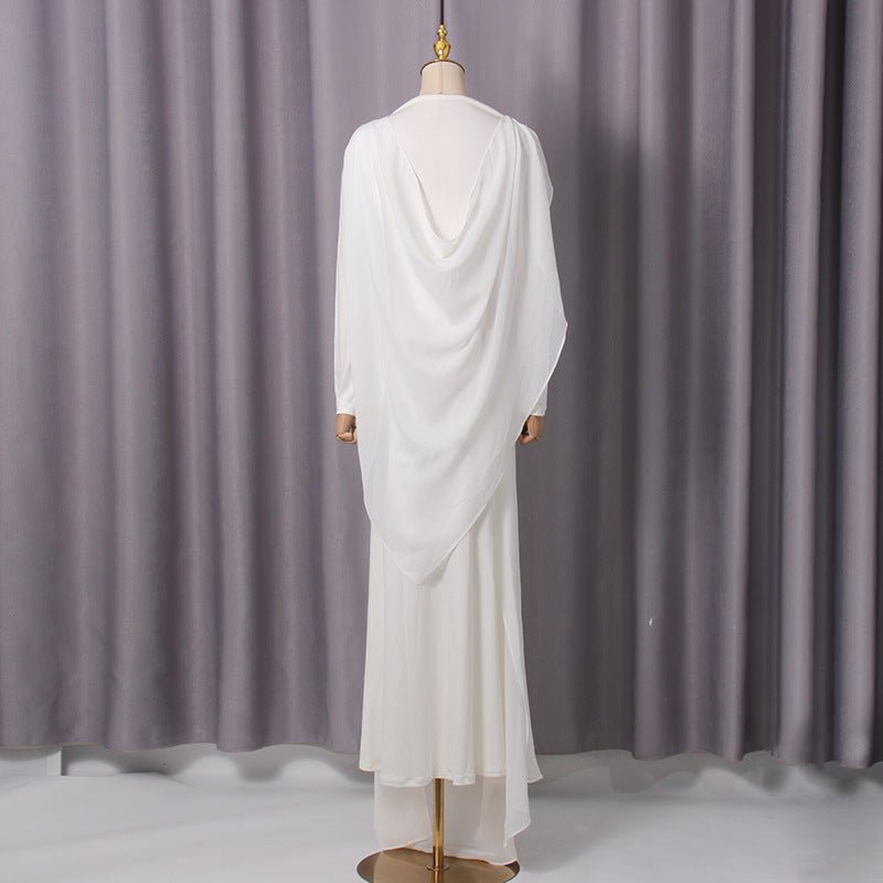 Diagonal twisted drape detail across the bodice in white crepe