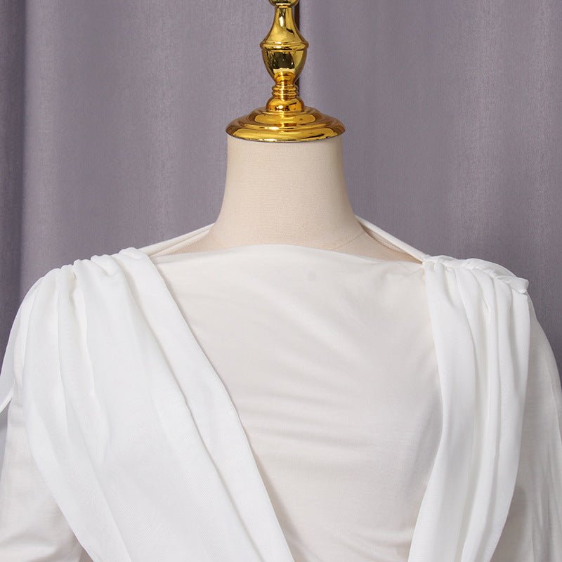 Back view of the long sleeve white maxi evening gown