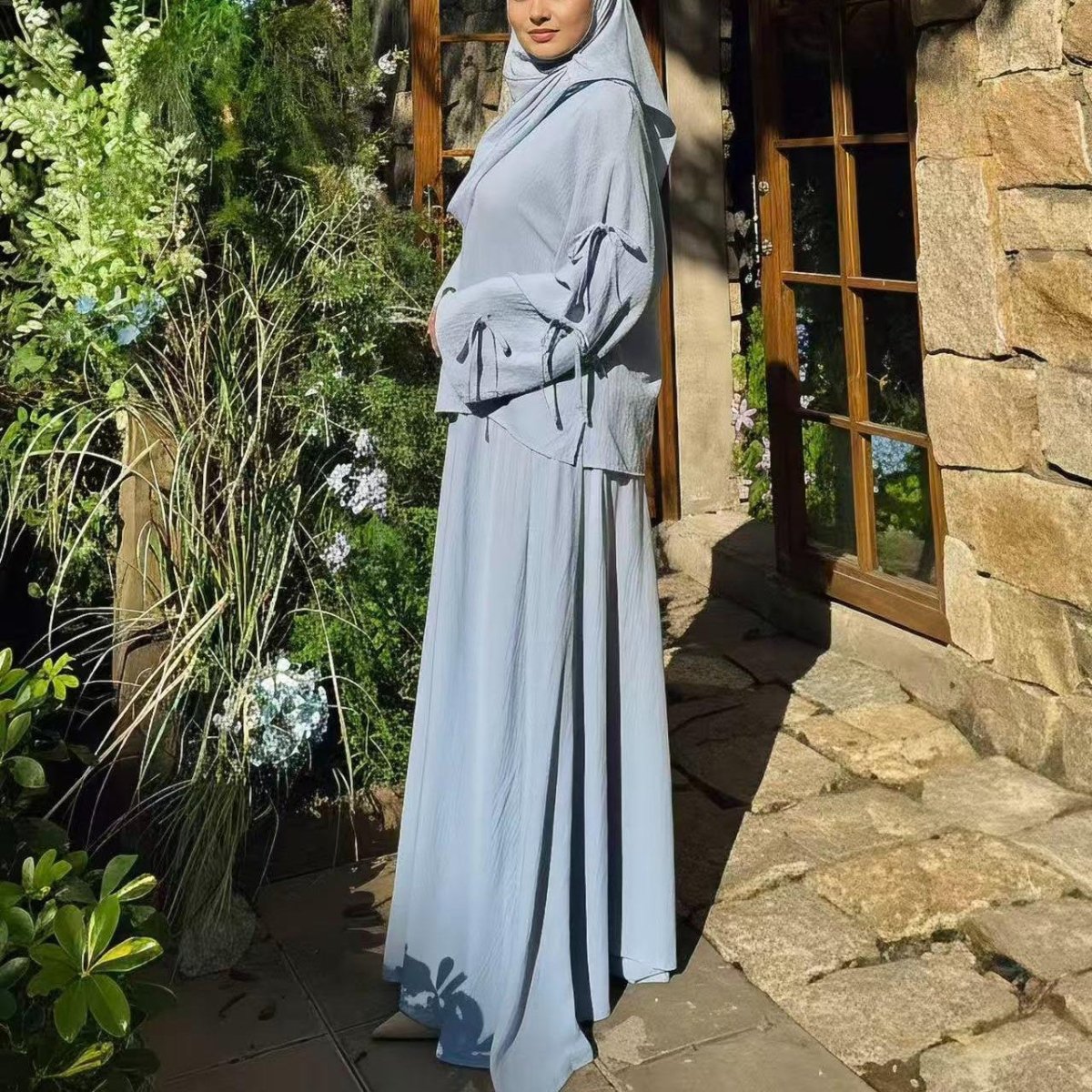 Two-piece tunic and maxi skirt set in emerald with practical pockets