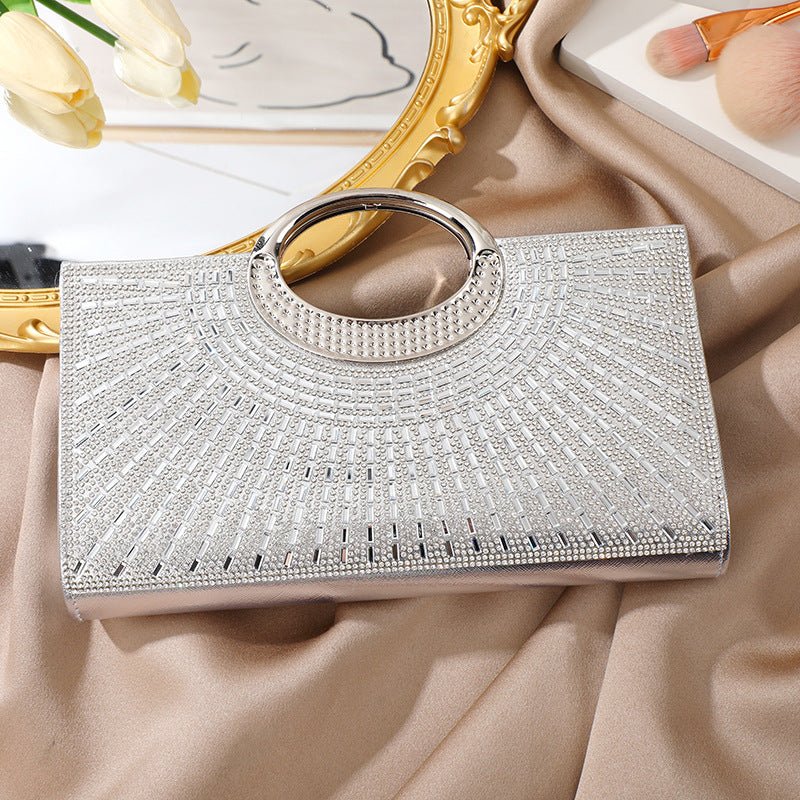 Close-up of radiating rhinestone pattern on vintage bridal clutch bag